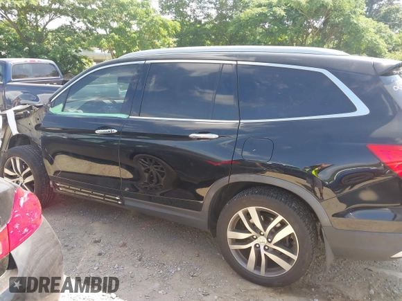 2017 Honda Pilot Touring с VIN 5FNYF5H9XHB024868, выставлен на аукционе IAAI как лот 42300608 с пробегом 133 018 миль миль и . История ставок и продаж доступна на DreamBid. Изображение 15.