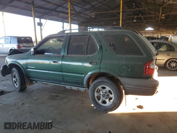 2002 Isuzu Rodeo z VIN 4S2CK58DX24320793, wystawiony jako Copart lot #46357065 z przebiegiem 180 306 mil mil oraz Szkody całkowita. Historia ofert i sprzedaży dostępna na DreamBid. Obrazek 2.
