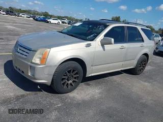 2008 Cadillac SRX AWD with VIN 1GYEE637280101842, listed as a IAAI auction lot 41417596 with 125,052 mi miles. Bid and sale history available at carsss.com. Image 2.