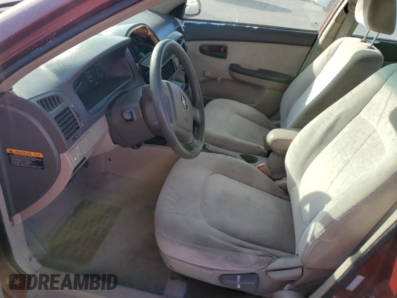 2005 Kia Spectra LX with VIN KNAFE122855108907, listed as a Copart auction lot 77502354 with Not Provided miles and Salvage Title. Bid and sale history available at carsss.com. Image 7.