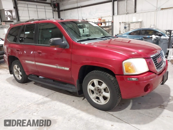 2005 GMC Envoy SLT with VIN 1GKDT13S352324863, listed as a IAAI auction lot 41707649 with 247,326 mi miles. Bid and sale history available at carsss.com. Image 1.