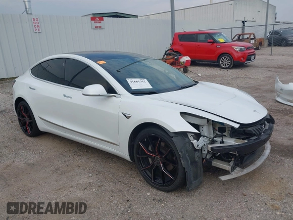2019 Tesla Model 3 Mid Range with VIN 5YJ3E1EA8KF472540, listed as a IAAI auction lot 41661312 with 75,575 mi miles and . Bid and sale history available at DreamBid. Image 1.