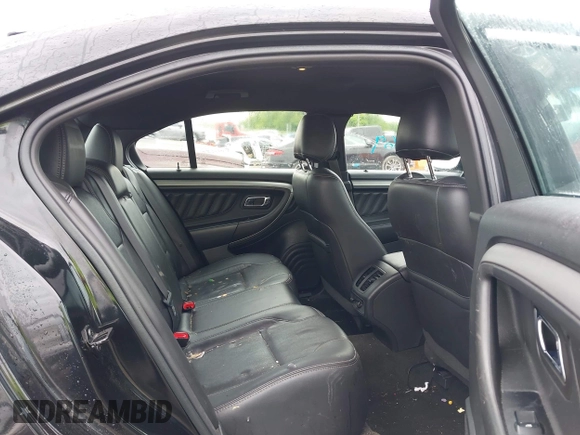 2015 Ford Taurus SEL z VIN 1FAHP2E81FG116032, wystawiony jako IAAI lot #42188269 z przebiegiem 178 774 mil mil oraz . Historia ofert i sprzedaży dostępna na DreamBid. Obrazek 8.