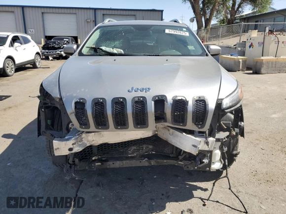 2016 Jeep Cherokee Latitude with VIN 1C4PJMCS9GW215870, listed as a Copart auction lot 57992675 with 212,594 mi miles and Salvage title. Bid and sale history available at DreamBid. Image 5.