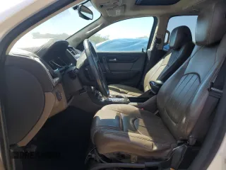 2014 GMC Acadia SLT z VIN 1GKKRSKD0EJ131557, wystawiony jako Copart lot #49689394 z przebiegiem Nie podano mil oraz Szkoda całkowita • Salvage title. Historia ofert i sprzedaży dostępna na DreamBid. Obrazek 7.