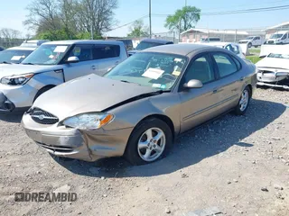 2003 Ford Taurus SE Standard with VIN 1FAFP53U73A245044, listed as a IAAI auction lot 41999582 with 85,870 mi miles. Bid and sale history available at carsss.com. Image 2.