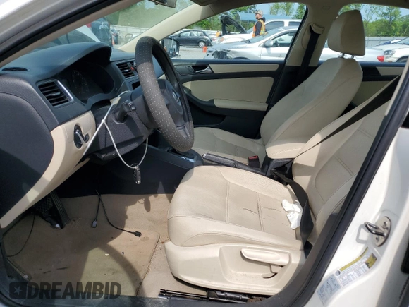 2011 Volkswagen Jetta SE with VIN 3VWDZ7AJ6BM381325, listed as a Copart auction lot 52987185 with 151,208 mi miles and Salvage title. Bid and sale history available at DreamBid. Image 7.