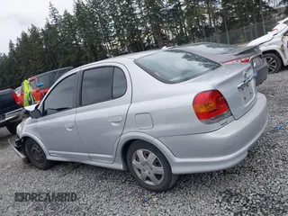 2003 Toyota ECHO with VIN JTDBT123930310732, listed as a IAAI auction lot 41890221 with 163,643 mi miles. Bid and sale history available at carsss.com. Image 14.