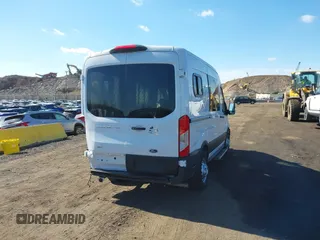 2023 Ford Transit z VIN 1FTYE2C84PKB90935, wystawiony jako IAAI lot #41649489 z przebiegiem 3 272 mil mil oraz . Historia ofert i sprzedaży dostępna na DreamBid. Obrazek 16.