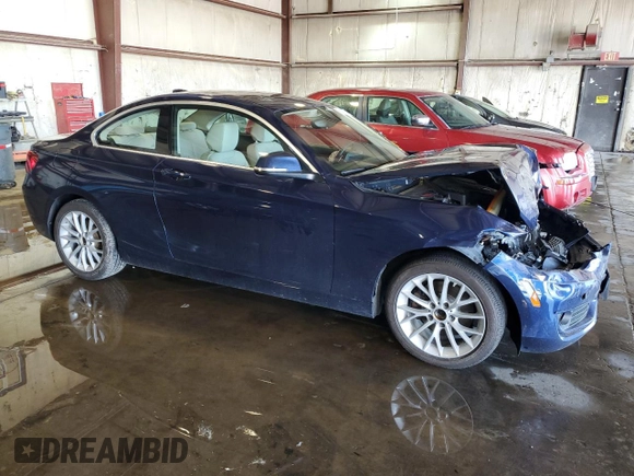 2015 BMW 2 Series 228i with VIN WBA1F5C54FVW98189, listed as a Copart auction lot 61815175 with 67,216 mi miles and Salvage title. Bid and sale history available at DreamBid. Image 4.