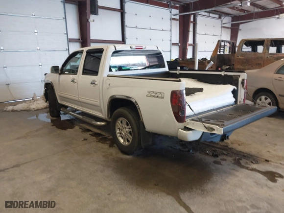 2012 Chevrolet Colorado LT w/1LT with VIN 1GCHTCFE3C8103014, listed as a IAAI auction lot 41267468 with 165,491 mi miles. Bid and sale history available at carsss.com. Image 3.