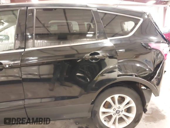 2017 Ford Escape SE with VIN 1FMCU9G94HUE08060, listed as a IAAI auction lot 41856229 with 187,838 mi miles and . Bid and sale history available at carsss.com. Image 6.