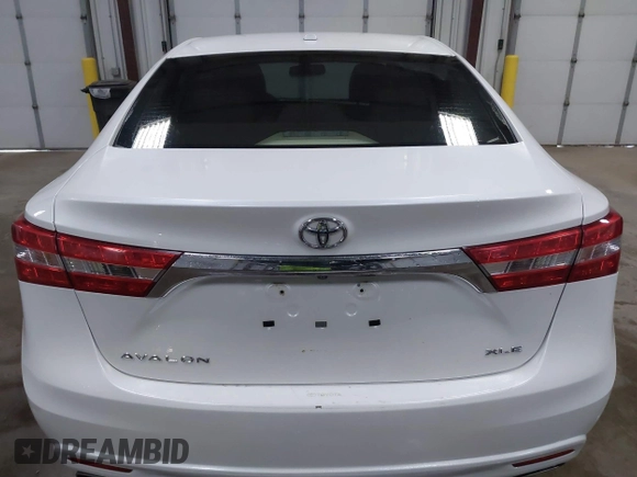 2014 Toyota Avalon Limited with VIN 4T1BK1EB6EU100635, listed as a IAAI auction lot 41609581 with 128,609 mi miles. Bid and sale history available at carsss.com. Image 16.