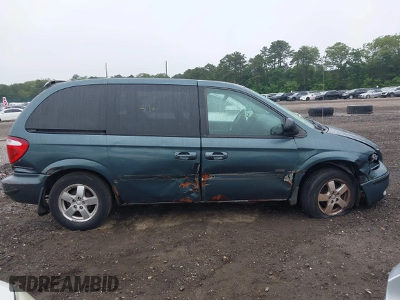 2005 Dodge Caravan SXT with VIN 1D4GP45R55B279825, listed as a IAAI auction lot 42532684 with 157,167 mi miles and . Bid and sale history available at DreamBid. Image 6.