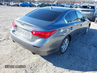 2015 Infiniti Q50 z VIN JN1BV7AR0FM397309, wystawiony jako IAAI lot #41752569 z przebiegiem 116 475 mil mil oraz . Historia ofert i sprzedaży dostępna na DreamBid. Obrazek 4.