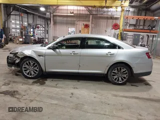 2013 Ford Taurus Limited with VIN 1FAHP2F83DG116657, listed as a IAAI auction lot 41533075 with 124,649 mi miles. Bid and sale history available at carsss.com. Image 14.