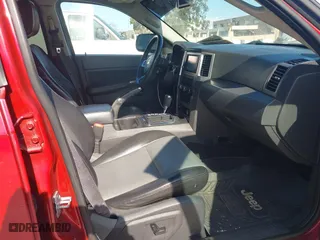 2010 Jeep Grand Cherokee Laredo with VIN 1J4PS4GK4AC121454, listed as a IAAI auction lot 41759966 with 69,390 mi miles. Bid and sale history available at carsss.com. Image 5.