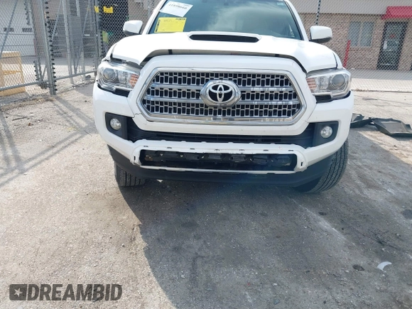 2017 Toyota Tacoma SR5 with VIN 3TMDZ5BN4HM018877, listed as a IAAI auction lot 41898666 with 198,848 mi miles. Bid and sale history available at carsss.com. Image 6.