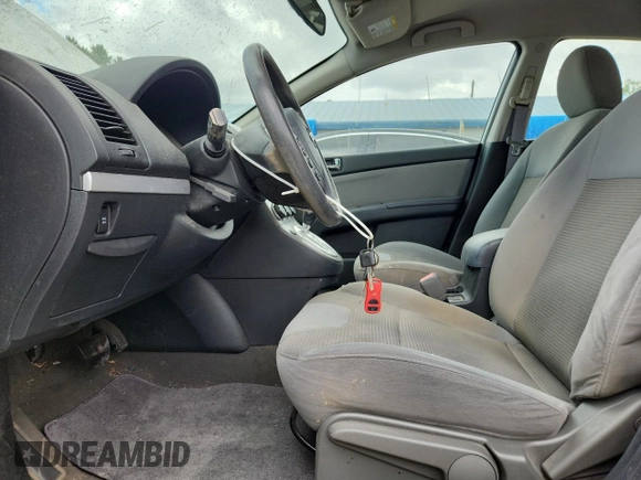 2011 Nissan Sentra S z VIN 3N1AB6AP2BL688735, wystawiony jako Copart lot #61795085 z przebiegiem 83 741 mil mil oraz Czysty tytuł • Clean title. Historia ofert i sprzedaży dostępna na DreamBid. Obrazek 7.