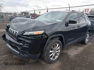 2014 Jeep Cherokee Limited with VIN 1C4PJMDB1EW156776, listed as a IAAI auction lot 41852167 with 130,514 mi miles and . Bid and sale history available at DreamBid. Image 18.