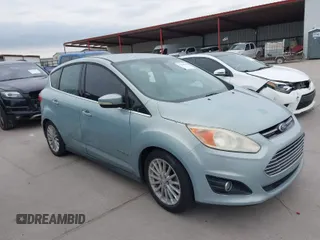 2013 Ford C-Max SEL with VIN 1FADP5BU8DL523402, listed as a IAAI auction lot 41676386 with 214,649 mi miles. Bid and sale history available at carsss.com. Image 1.