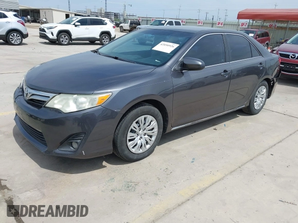 2014 Toyota Camry L with VIN 4T4BF1FKXER379158, listed as a IAAI auction lot 42050926 with 88,060 mi miles and . Bid and sale history available at DreamBid. Image 2.
