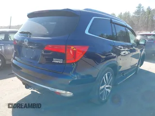2017 Honda Pilot Touring with VIN 5FNYF6H98HB020341, listed as a IAAI auction lot 42037156 with 73,511 mi miles and . Bid and sale history available at DreamBid. Image 4.
