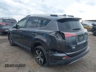 2018 Toyota RAV4 XLE with VIN JTMRFREV2JJ730874, listed as a IAAI auction lot 41980075 with 60,268 mi miles. Bid and sale history available at carsss.com. Image 3.
