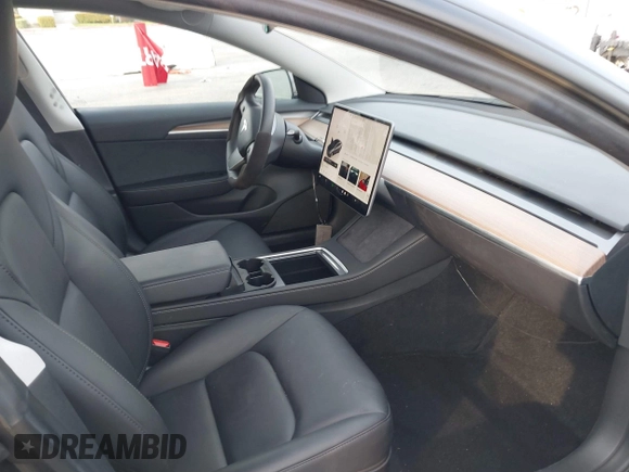 2023 Tesla Model 3 Long Range with VIN 5YJ3E1EB7PF681784, listed as a IAAI auction lot 41534837 with 20,882 mi miles and . Bid and sale history available at DreamBid. Image 5.