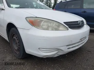 2004 Toyota Camry LE with VIN JTDBE32K840256161, listed as a IAAI auction lot 42000050 with 367,016 mi miles. Bid and sale history available at carsss.com. Image 6.