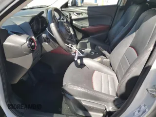 2018 Mazda CX-3 Touring z VIN JM1DKFC74J0312864, wystawiony jako Copart lot #55862845 z przebiegiem 75 584 mil mil oraz Szkoda całkowita • Salvage title. Historia ofert i sprzedaży dostępna na DreamBid. Obrazek 7.
