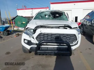 2022 Toyota Tacoma SR5 with VIN 3TMDZ5BNXNM122169, listed as a IAAI auction lot 41992758 with 36,686 mi miles and . Bid and sale history available at DreamBid. Image 12.