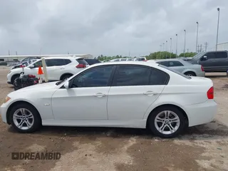 2008 BMW 3 Series 328i with VIN WBAVA37518NL53526, listed as a IAAI auction lot 41956298 with 208,586 mi miles and . Bid and sale history available at DreamBid. Image 14.