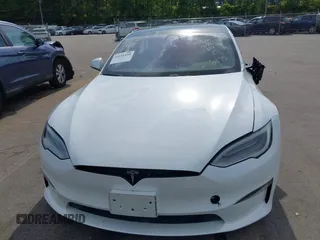 2022 Tesla Model S with VIN 5YJSA1E57NF462175, listed as a IAAI auction lot 42231439 with Not provided miles and . Bid and sale history available at DreamBid. Image 12.
