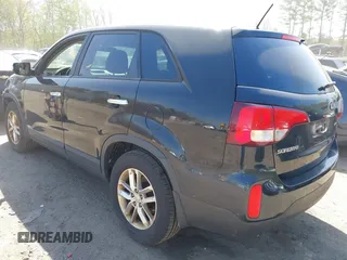2014 Kia Sorento LX with VIN 5XYKTDA69EG425180, listed as a IAAI auction lot 42125882 with 194,319 mi miles. Bid and sale history available at carsss.com. Image 3.