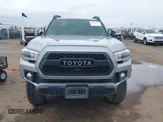 2017 Toyota Tacoma SR5 with VIN 3TMCZ5AN8HM051829, listed as a IAAI auction lot 41616329 with 64,113 mi miles and . Bid and sale history available at DreamBid. Image 12.