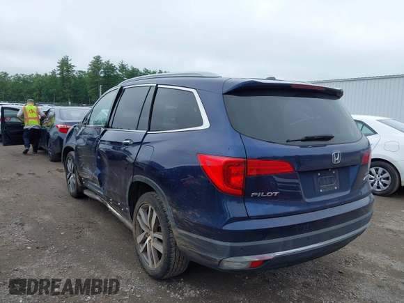 2017 Honda Pilot Touring with VIN 5FNYF6H99HB093136, listed as a IAAI auction lot 42507326 with 125,579 mi miles and . Bid and sale history available at DreamBid. Image 3.