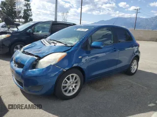 2010 Toyota Yaris with VIN JTDKT4K37A5281085, listed as a Copart auction lot 51867385 with 127,333 mi miles and Salvage Title. Bid and sale history available at carsss.com. Image 1.