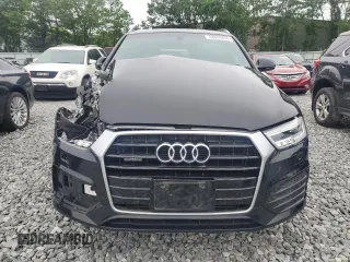 2017 Audi Q3 Prestige with VIN WA1GCCFS7HR001163, listed as a Copart auction lot 58800655 with 52,034 mi miles and Salvage title. Bid and sale history available at DreamBid. Image 5.