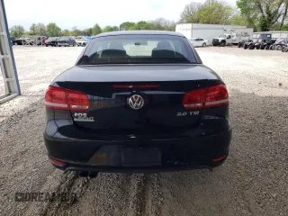 2013 Volkswagen Eos Komfort with VIN WVWBW8AH1DV001953, listed as a Copart auction lot 54167185 with 118,696 mi miles and Clean Title. Bid and sale history available at DreamBid. Image 6.