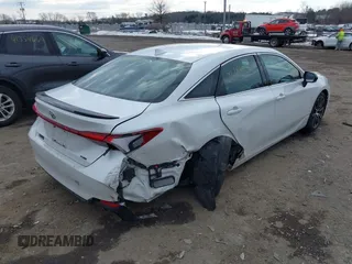 2019 Toyota Avalon XLE with VIN 4T1BZ1FB5KU014903, listed as a IAAI auction lot 41388692 with 100,599 mi miles. Bid and sale history available at carsss.com. Image 4.