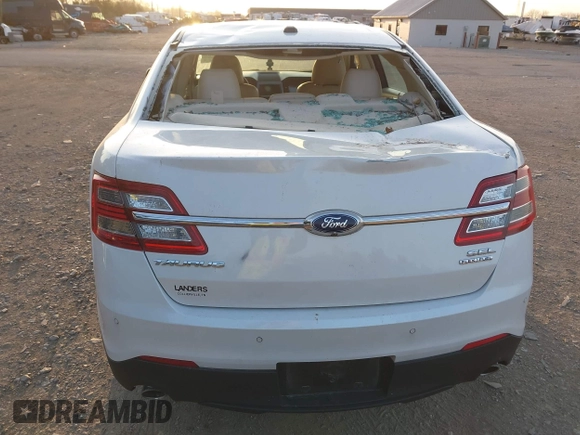 2015 Ford Taurus SEL with VIN 1FAHP2E82FG202143, listed as a IAAI auction lot 42053737 with 113,839 mi miles and . Bid and sale history available at carsss.com. Image 16.