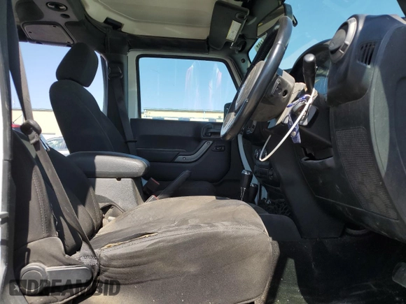 2016 Jeep Wrangler Unlimited Sport RHD z VIN 1C4BJWKG1GL294195, wystawiony jako Copart lot #51274185 z przebiegiem 135 720 mil mil oraz Szkoda całkowita • Salvage title. Historia ofert i sprzedaży dostępna na DreamBid. Obrazek 7.