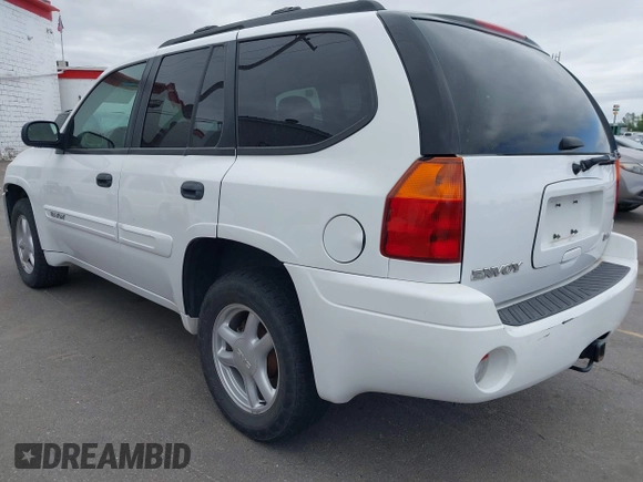 2005 GMC Envoy SLE z VIN 1GKDT13S652279384, wystawiony jako IAAI lot #42208597 z przebiegiem 147 036 mil mil oraz . Historia ofert i sprzedaży dostępna na DreamBid. Obrazek 3.