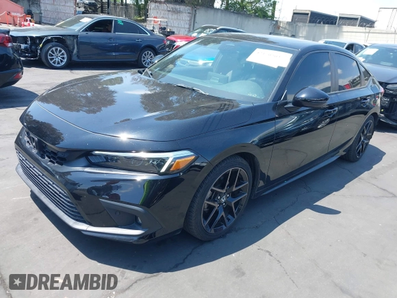 2023 Honda Civic Sport Touring z VIN 19XFL1H80PE009154, wystawiony jako IAAI lot #42170202 z przebiegiem 17 291 mil mil oraz . Historia ofert i sprzedaży dostępna na DreamBid. Obrazek 18.