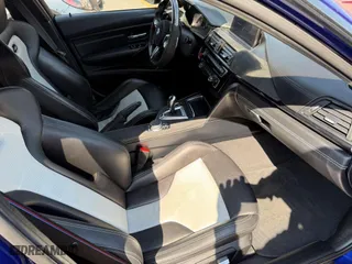 2018 BMW M3 with VIN WBS8M9C59J5L71951, listed as a IAAI auction lot 42129203 with 50,011 mi miles. Bid and sale history available at carsss.com. Image 5.