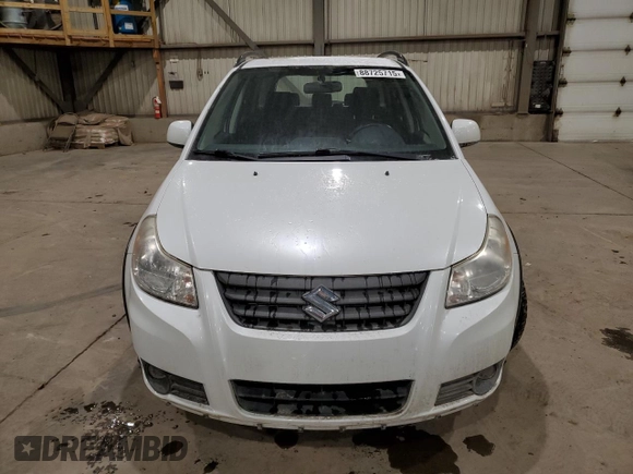 2013 Suzuki SX4 Crossover z VIN JS2YB5A30D6102684, wystawiony jako Copart lot #88725715 z przebiegiem 104 023 mil mil oraz Szkoda całkowita • Salvage title. Historia ofert i sprzedaży dostępna na DreamBid. Obrazek 5.