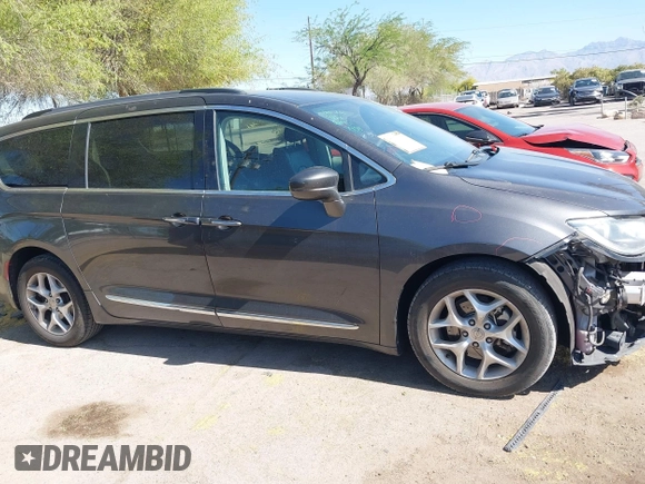 2017 Chrysler Pacifica Touring L with VIN 2C4RC1BG0HR826881, listed as a IAAI auction lot 42171240 with 214,188 mi miles and . Bid and sale history available at DreamBid. Image 13.