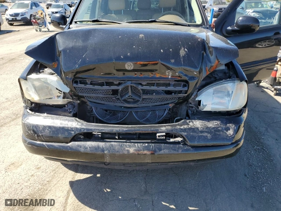2001 Mercedes-Benz M-Class with VIN 4JGAB54E41A280868, listed as a Copart auction lot 47829955 with 111,475 mi miles and Salvage Title. Bid and sale history available at carsss.com. Image 12.