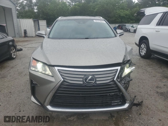 2017 Lexus RX 350 z VIN 2T2ZZMCA0HC072113, wystawiony jako Copart lot #55808185 z przebiegiem 99 900 mil mil oraz Czysty tytuł • Clean title. Historia ofert i sprzedaży dostępna na DreamBid. Obrazek 5.